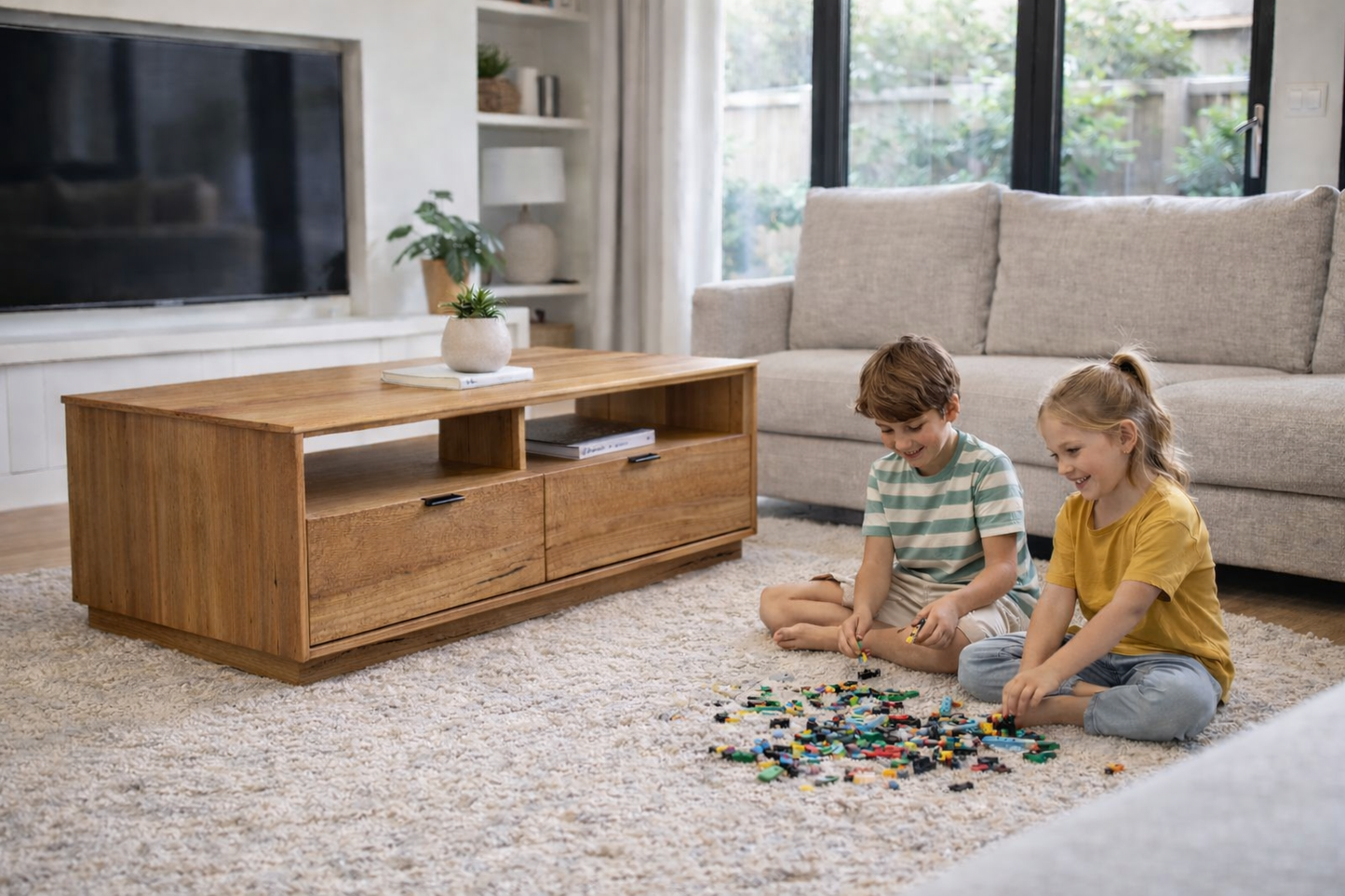 Timber Coffee Table in a living room with two children playing with toys on the floor