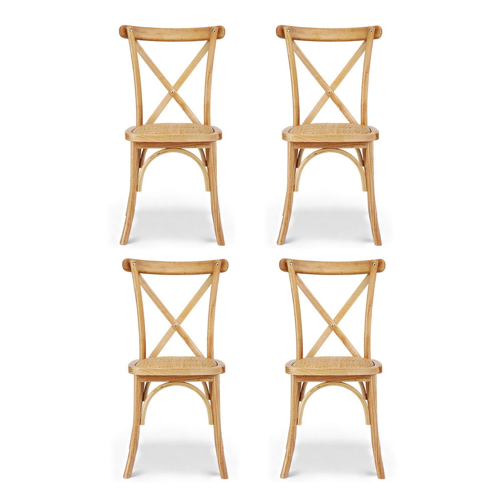 Four wooden chairs with cross-back design 