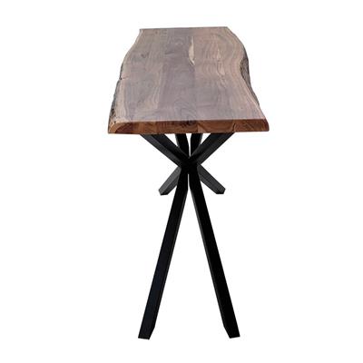 Wooden table with a black metal base on a white background