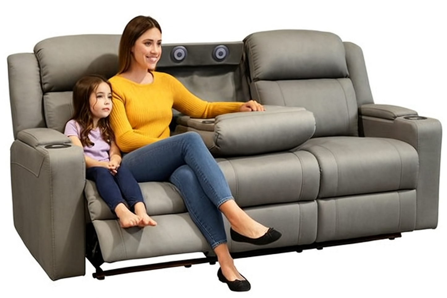 Woman and child sitting on a gray reclining sofa with cup holders.