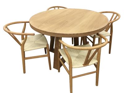 Round wooden table with four matching natural wishbone chairs