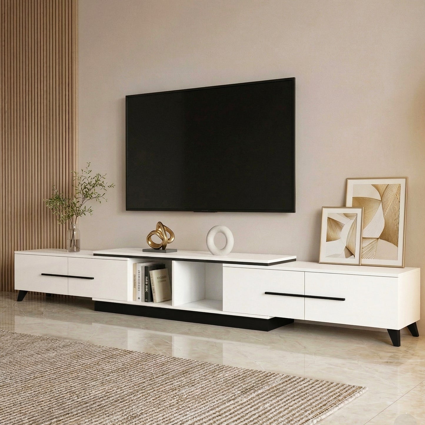 Modern living room with a white TV stand, black flat-screen TV, and decorative items.